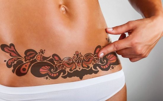 Tattoo on the belly for girls photo