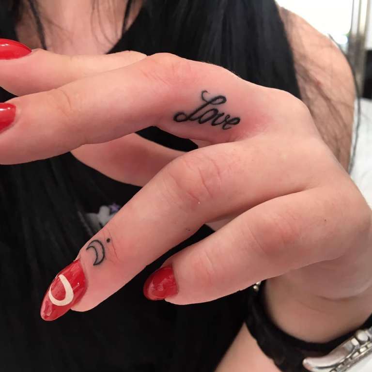 Tattoo on a girl's finger