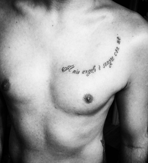 tattoo inscription on men's chest