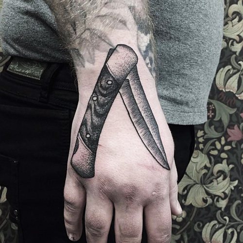 Tattoo Butterfly Knife. Photo, meaning, thumbnails with a rose, an inscription, a spider's web