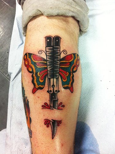 Tattoo Butterfly Knife. Photo, meaning, sketches of the rose, the inscription, a spider's web