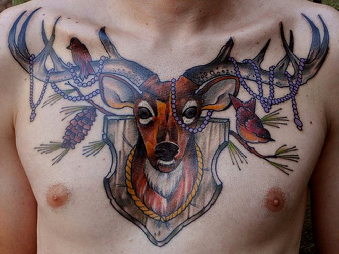 Tattoo deer on male chest