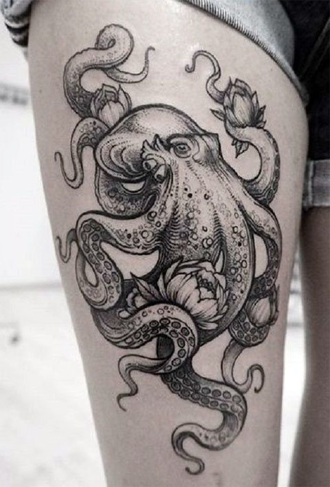 Tattoo of octopus on girls leg - photo