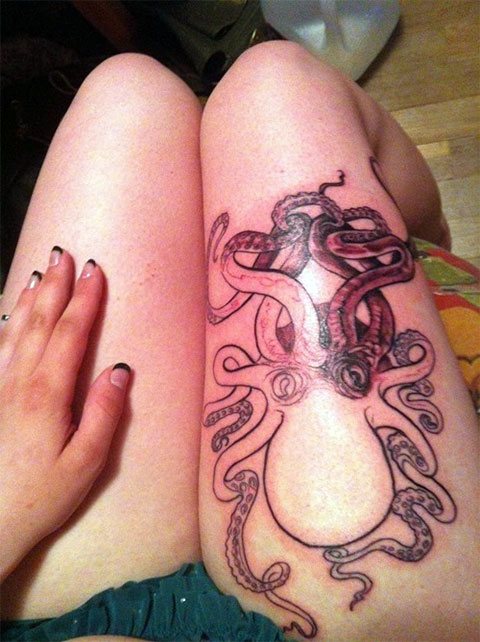 Tattoo of an octopus on a girl's leg - photo