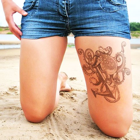 Tattoo of an octopus on a girl's leg
