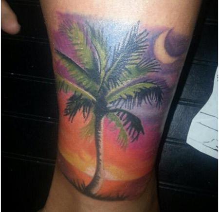 Tattoo Palm Tree on his leg photo
