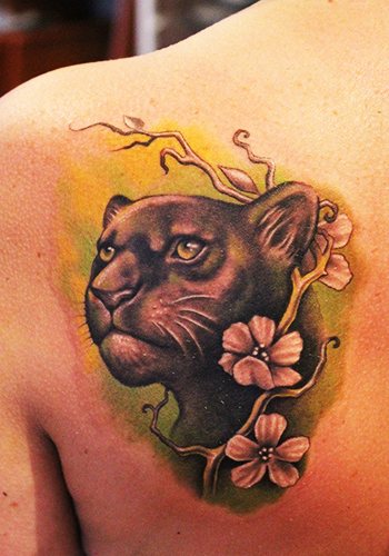 Panther tattoo for girls. Meaning, photo, on the arm, leg, shoulder, back, lower back