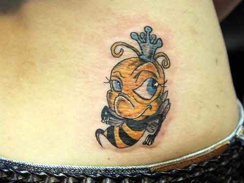 Tattoo bee on lumbar area
