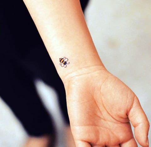 Tattoo a bee on your wrist