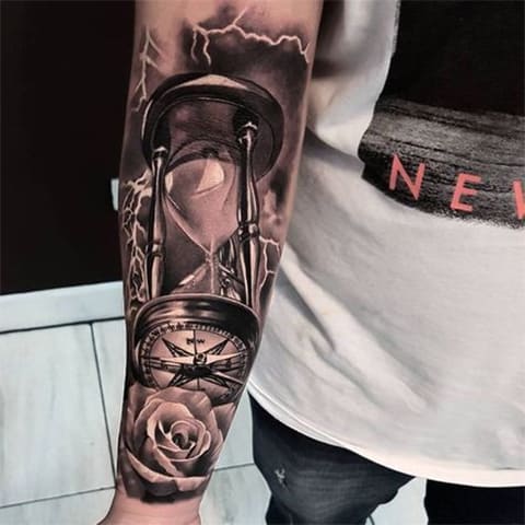Hourglass tattoo on forearm