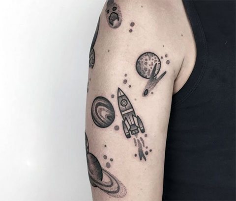 Planet tattoo on hand