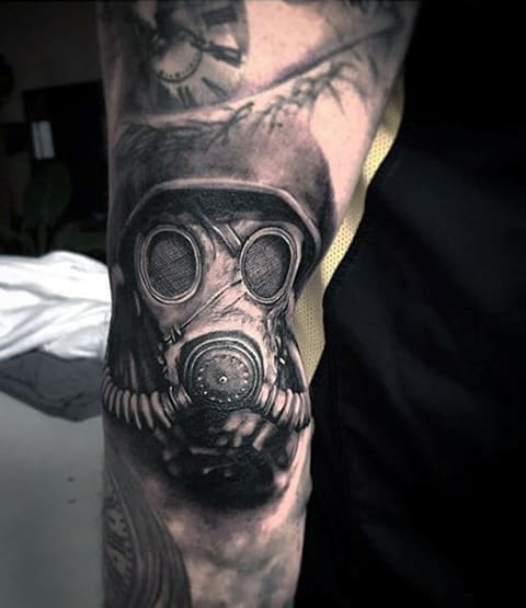 Gas mask tattoo on hand