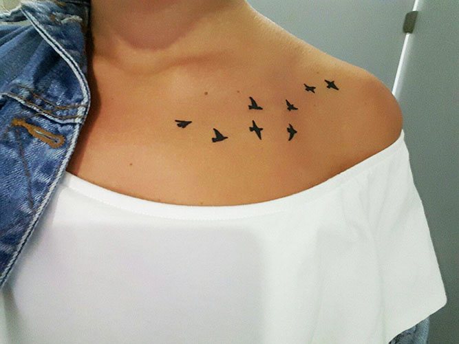 Tattoo birds on the collarbone. Photos, meaning, sketches
