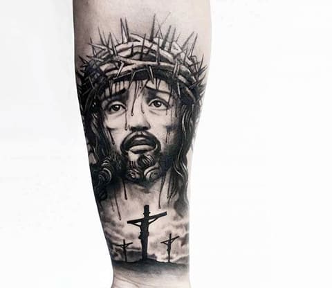 Tattoo of Jesus Christ crucified on the cross