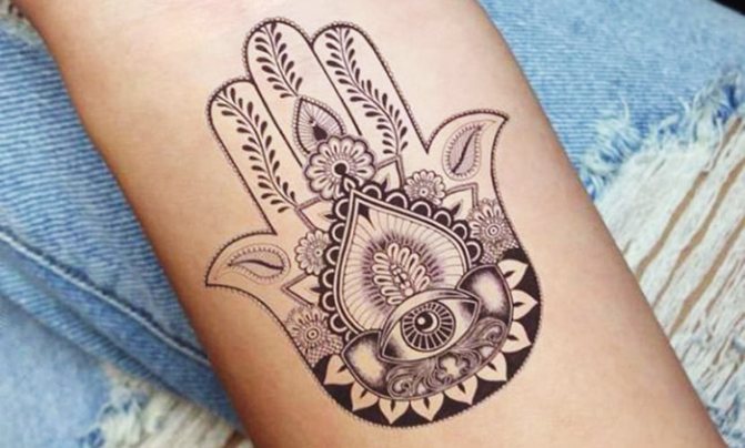 Tattoo of the Arm of Fatima. Sketches, meanings for girls, photos