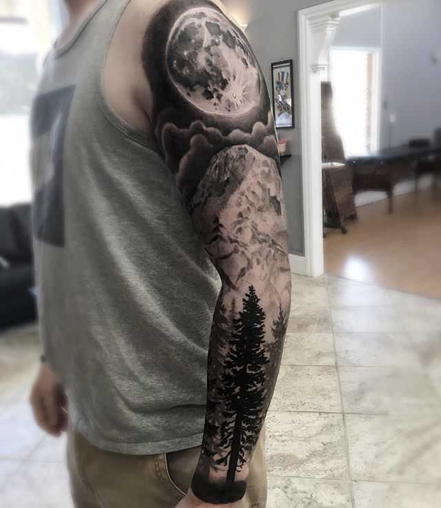 tattoo arm forest on a man
