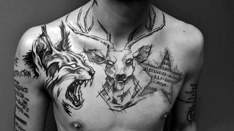 Tattoo of a lynx on a man