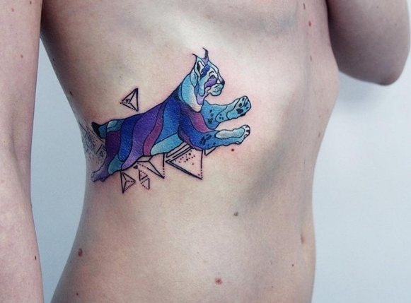 Tattoo a lynx in color on side of torso