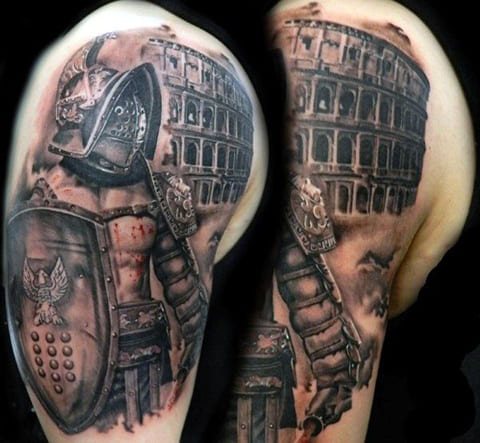 Tattoo with gladiator on his shoulder