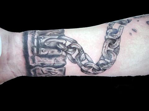 Tattoo shackles on hand