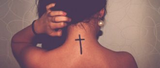 cross tattoo on back photo
