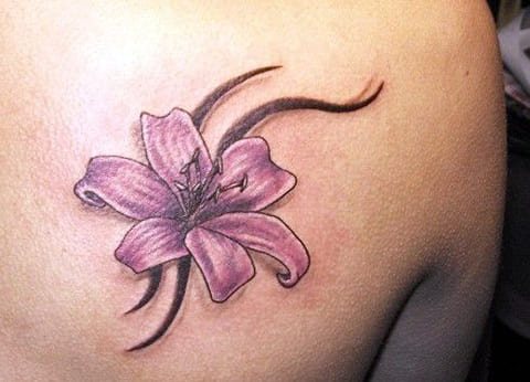 Tattoo with a lily on a girl - photo