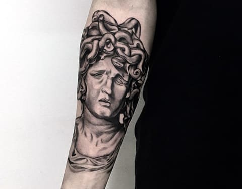 Tattoo of Medusa Gorgon on hand