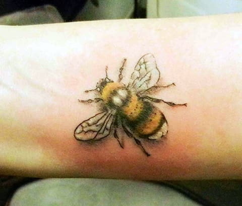 Tattoo and bee - photo