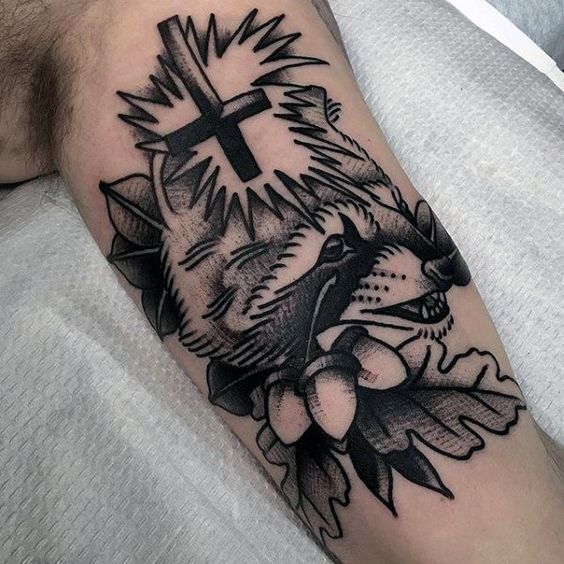 Cross inverted tattoo