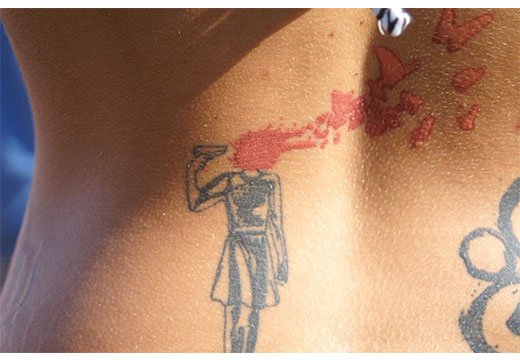 Tattoo from a birthmark on his back