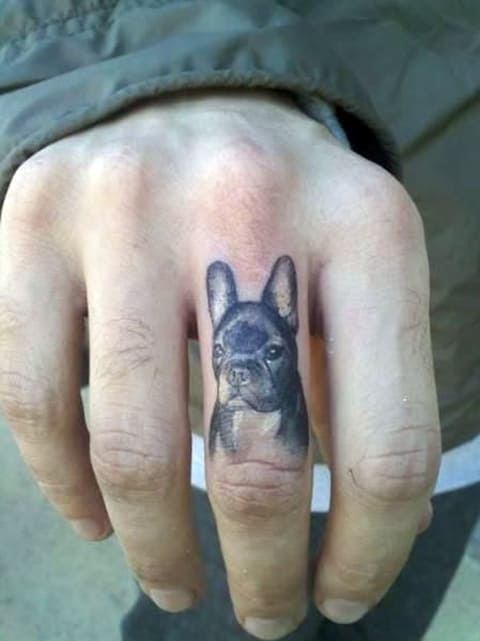 Tattoo a dog on your finger