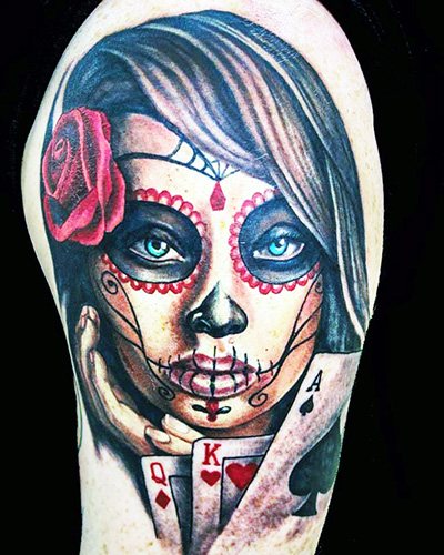Tattoo of Santa Muerte in women, men. Meaning, designs, photos
