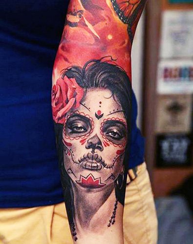 Tattoo of Santa Muerte in women, men. Meaning, sketches, photos