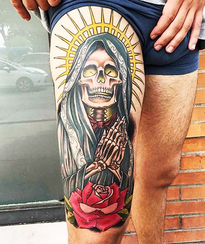 Tattoo of Santa Muerte in women, men. Meaning, designs, photos