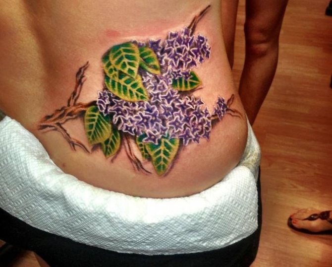 Tattoo of a lilac on the heel