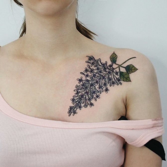Tattooed lilacs above left breast may symbolize healing of emotional wounds