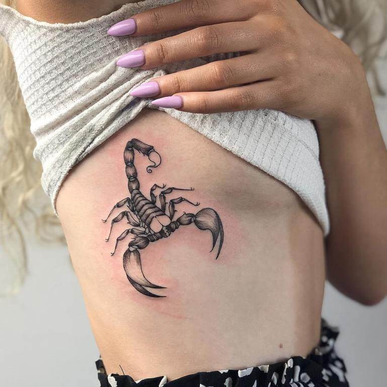 Tattoo of a scorpion in the sight