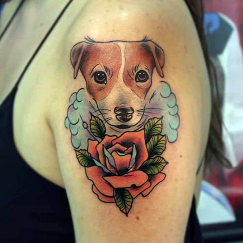 Tattoo a dog on a girl's shoulder