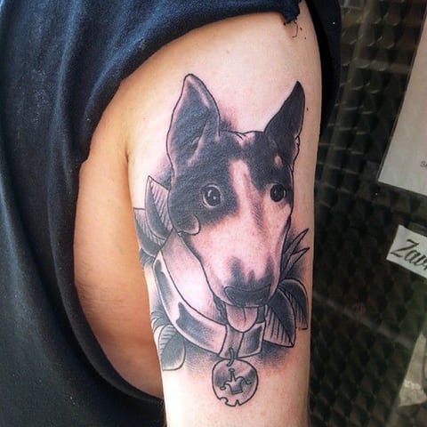 Tattoo dog on hand
