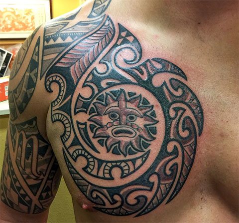 Tattoo sun on chest