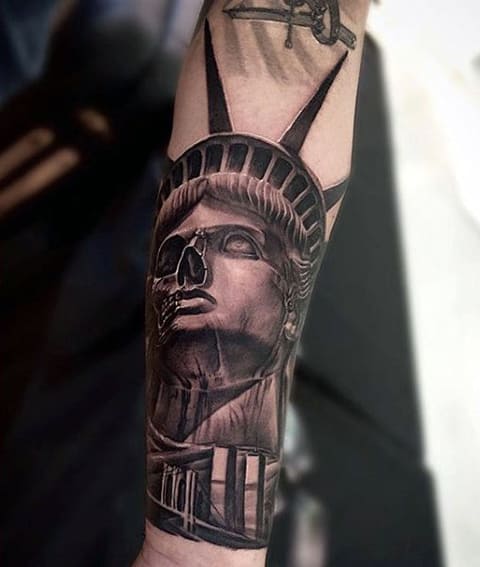Skull caped Statue of Liberty tattoo