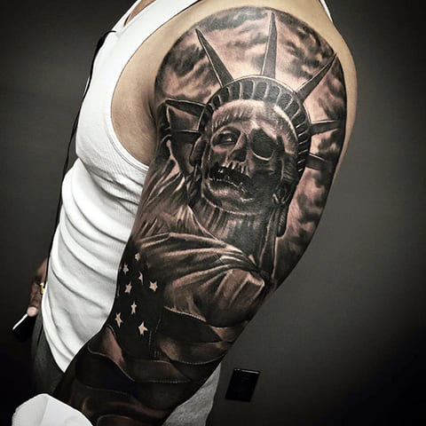 Skull Statue of Liberty tattoo