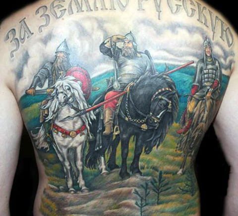 Tattoo of three bogatyrs on his back - photo