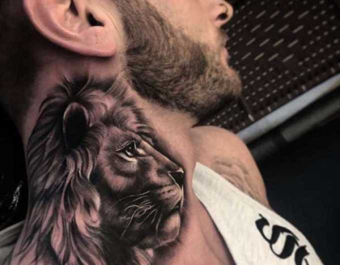A tattoo in the form of a calm lion - the epitome of steadfastness