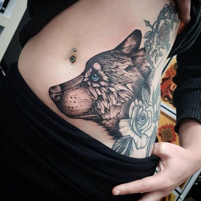 Tattoo of a wolf with flowers
