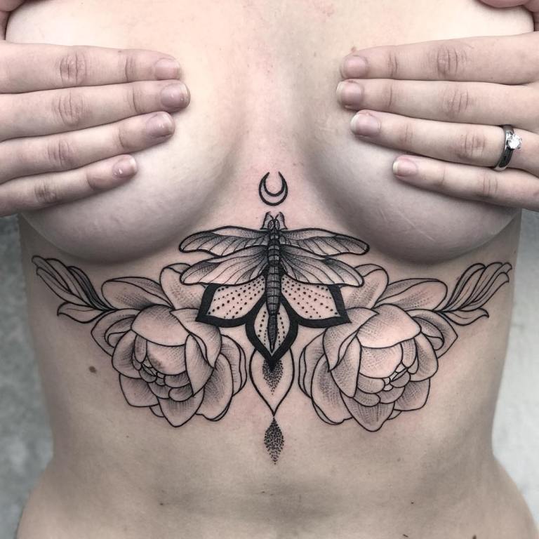 Tattoo near breasts