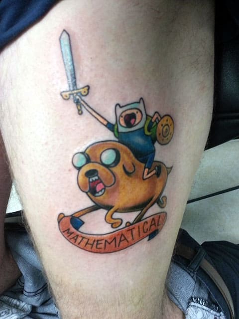 Adventure Time tattoo on thigh