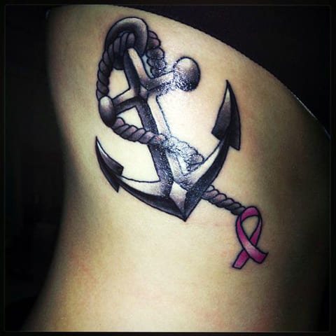 Anchor tattoo on a girl's side
