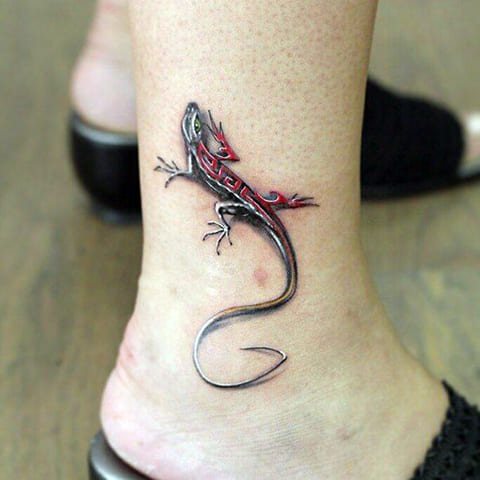 Tattoo lizard on legs