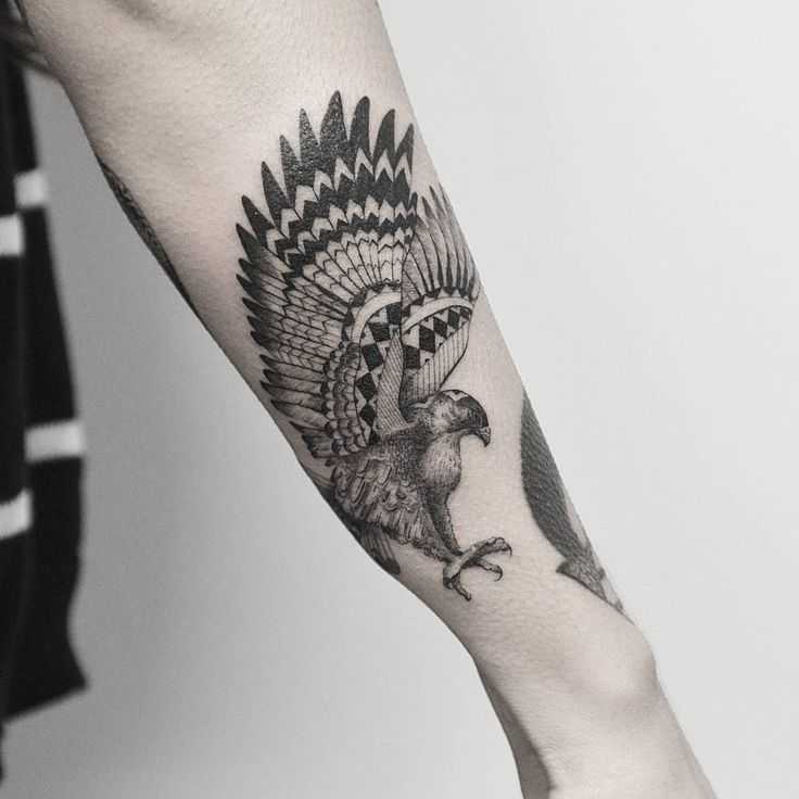 Tattoo of a mohawk on your arm